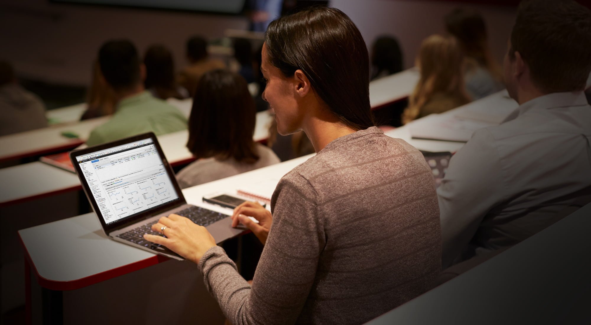 Woman seated at computer