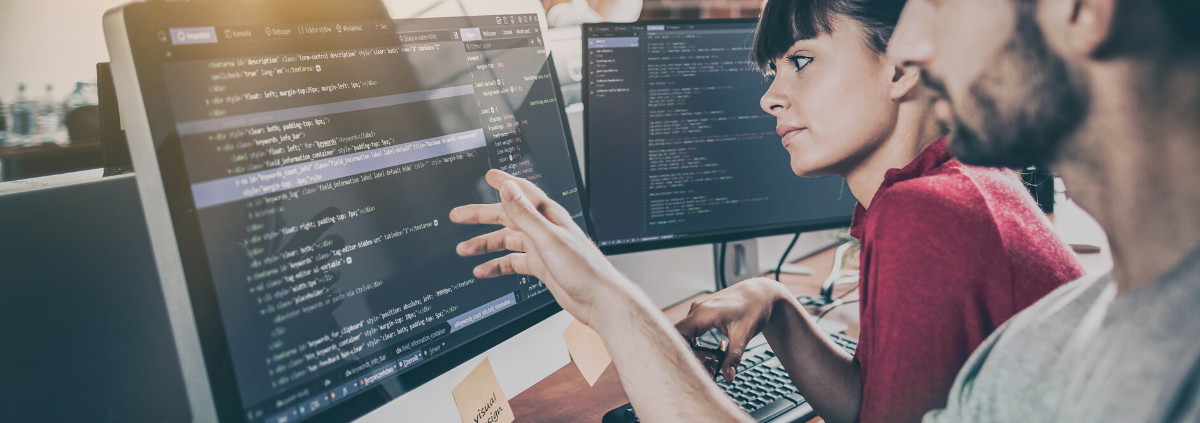 Man and woman looking at computer screen